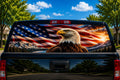 Eagle and Flag Sunset perforated rear-window decal installed on a pickup truck back glass