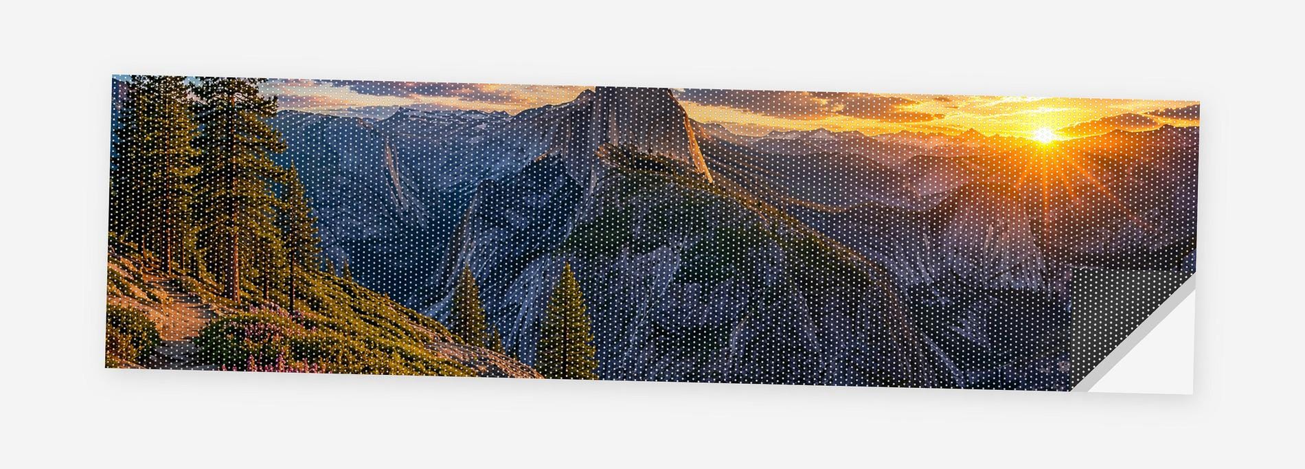 Yosemite Valley Sunrise 68 x 18.5 inch perforated vinyl truck decal printed flat on white, corner folded up showing the perforation pattern and liner