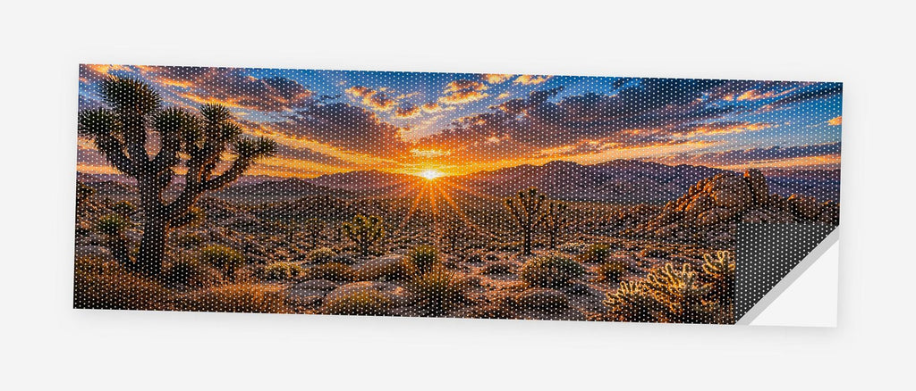 Joshua Tree Desert Sunset 68 x 18.5 inch perforated vinyl truck decal printed flat on white, corner folded up showing the perforation pattern and liner
