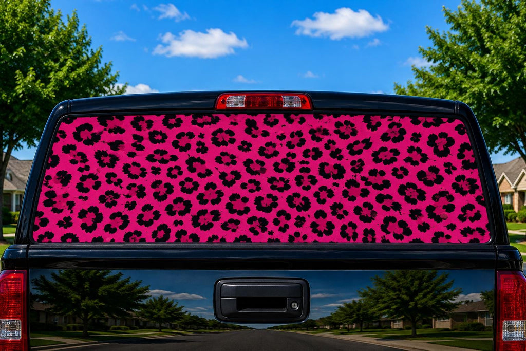 Pink Leopard Print perforated rear-window decal installed on a pickup truck back glass