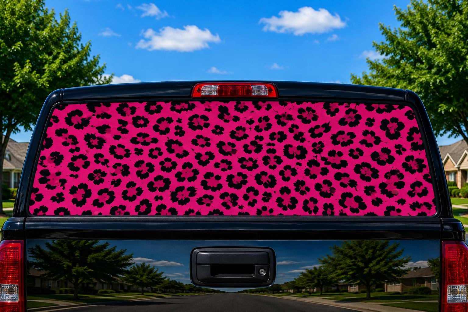 Pink Leopard Print perforated rear-window decal installed on a pickup truck back glass