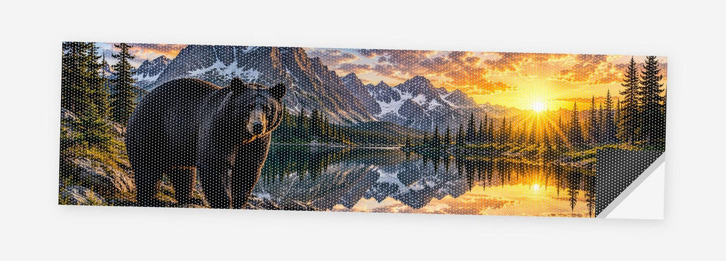 Black Bear Mountain Lake 68 x 18.5 inch perforated vinyl truck decal printed flat on white, corner folded up showing the perforation pattern and liner