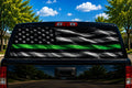Thin Green Line Steel Flag perforated rear-window decal installed on a pickup truck back glass