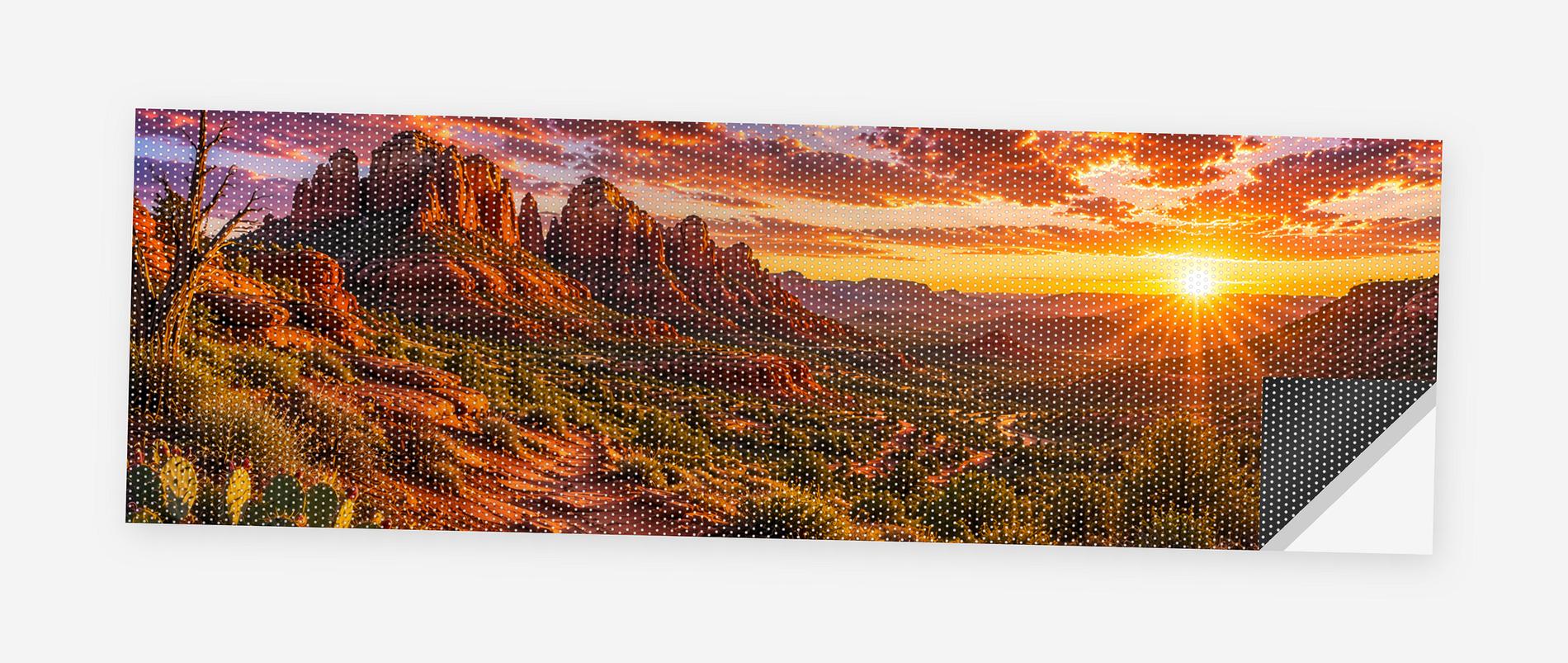 Red Rock Canyon Sunset 68 x 18.5 inch perforated vinyl truck decal printed flat on white, corner folded up showing the perforation pattern and liner