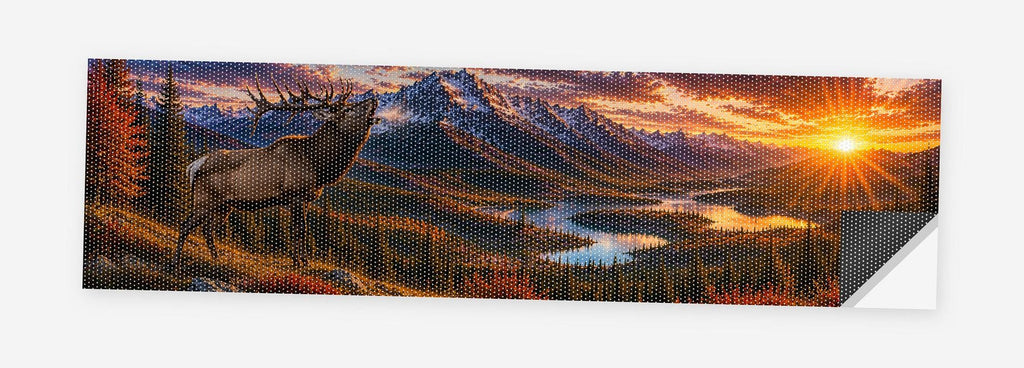 Elk Ridge Sunset 68 x 18.5 inch perforated vinyl truck decal printed flat on white, corner folded up showing the perforation pattern and liner