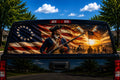 1776 Patriot Flag perforated rear-window decal installed on a pickup truck back glass