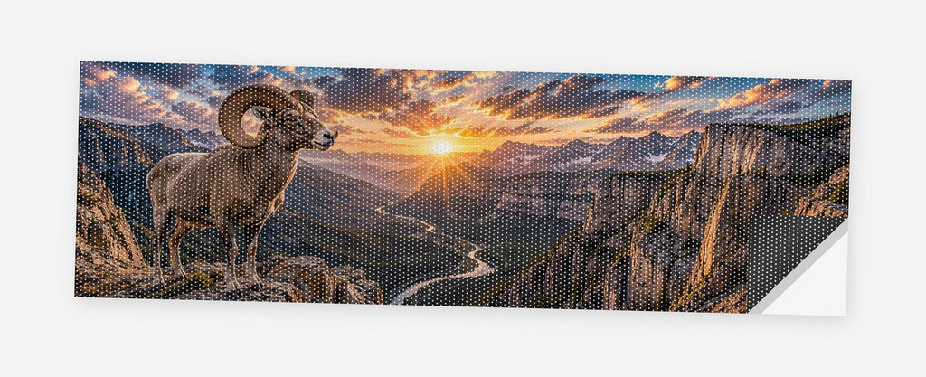 Bighorn Canyon Sunrise 68 x 18.5 inch perforated vinyl truck decal printed flat on white, corner folded up showing the perforation pattern and liner