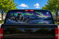 Wolves Under the Aurora perforated rear-window decal installed on a pickup truck back glass