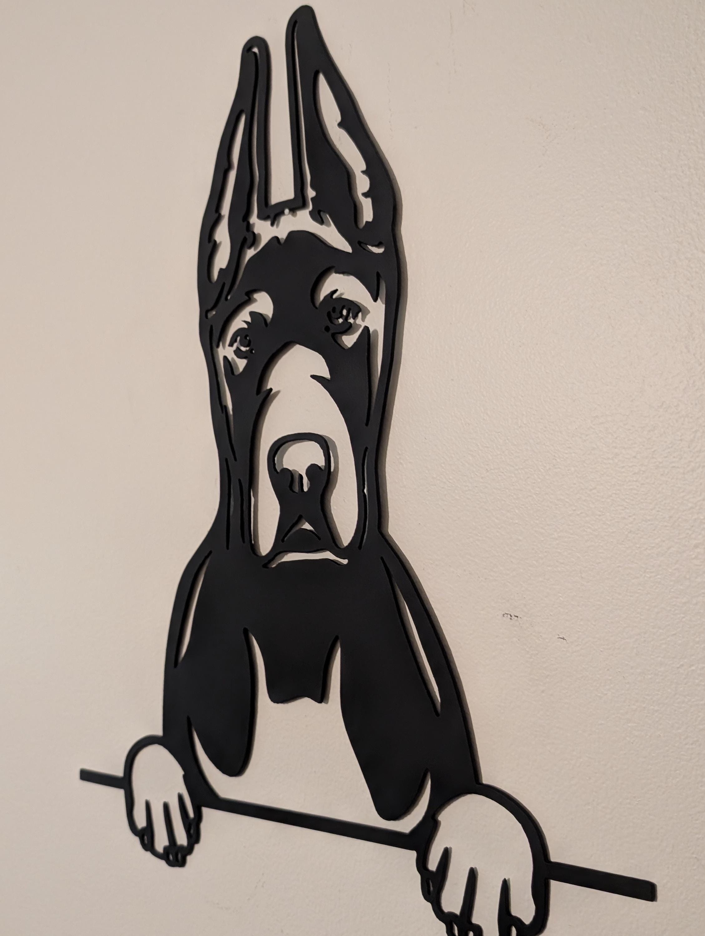Cropped Ear Great Dane plasma-cut 14-gauge steel dog sign - real photo, angled view showing the flat black finish and cut depth.