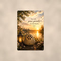 Paw print memorial stone by the lake memorial art titled "You left paw prints on our hearts" on a 8x12 inch sublimated aluminum sign with rounded corners and mounting holes, shown straight on against a warm neutral wall