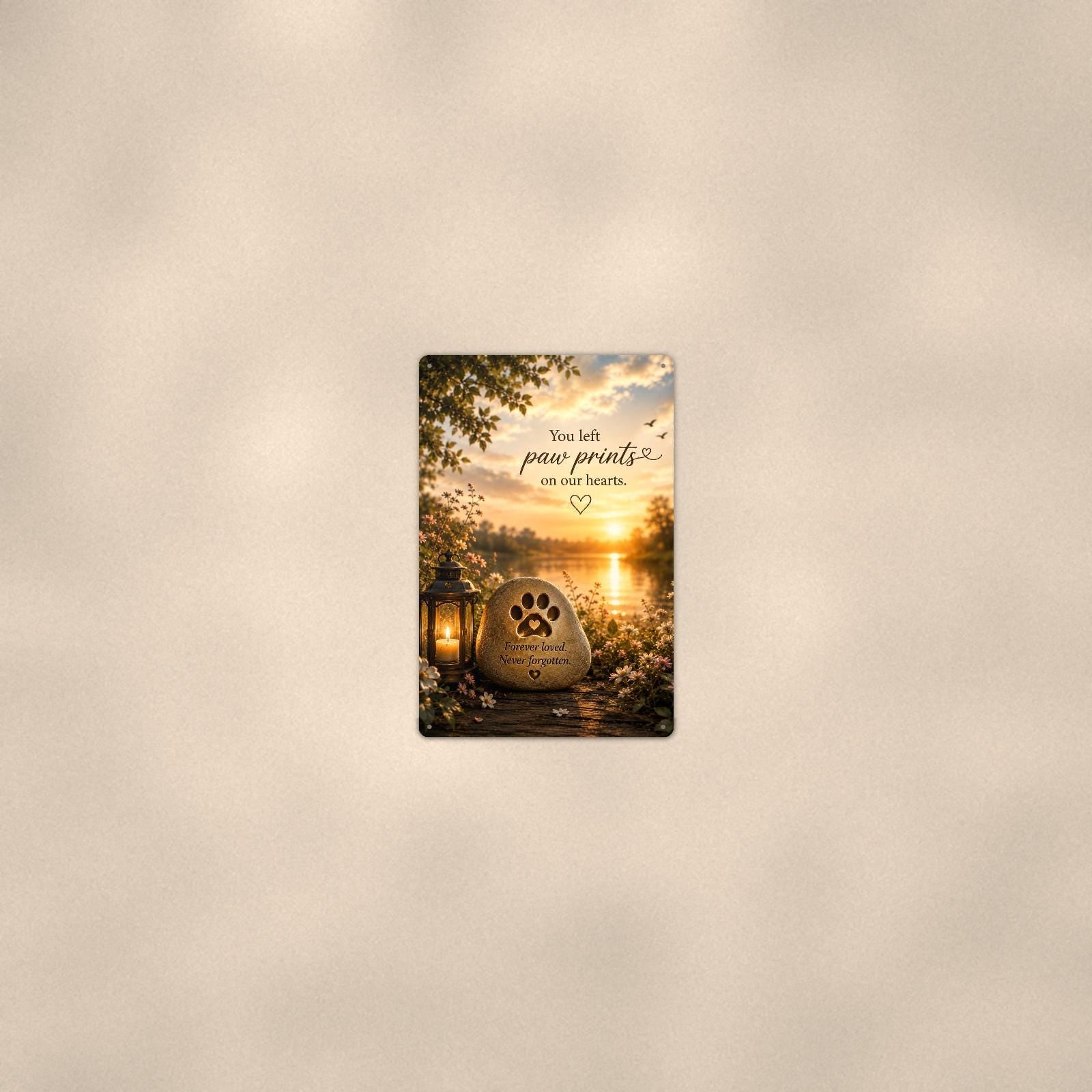 Paw print memorial stone by the lake memorial art titled "You left paw prints on our hearts" on a 8x12 inch sublimated aluminum sign with rounded corners and mounting holes, seen from farther back, small on a softly lit wall