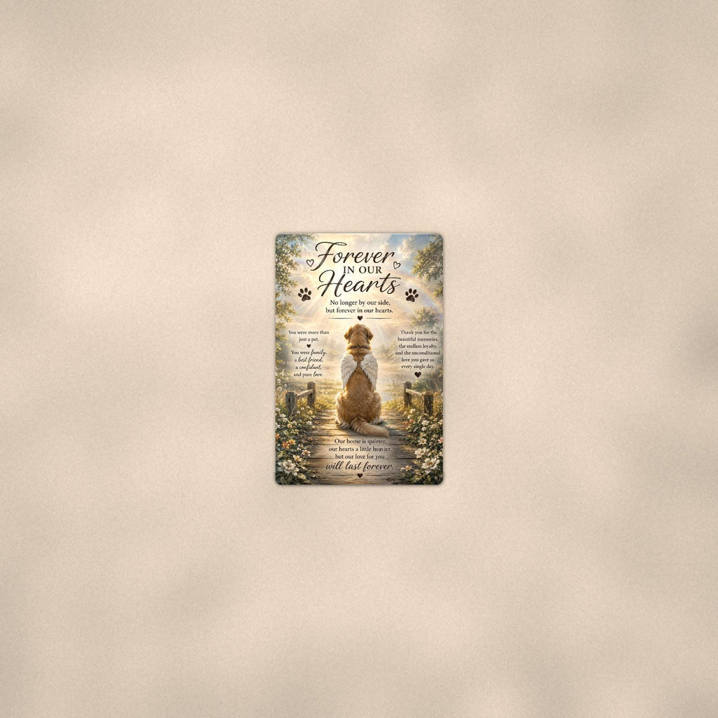 Golden retriever with angel wings memorial art titled "Forever In Our Hearts" on a 8x12 inch sublimated aluminum sign with rounded corners and mounting holes, seen from farther back, small on a softly lit wall