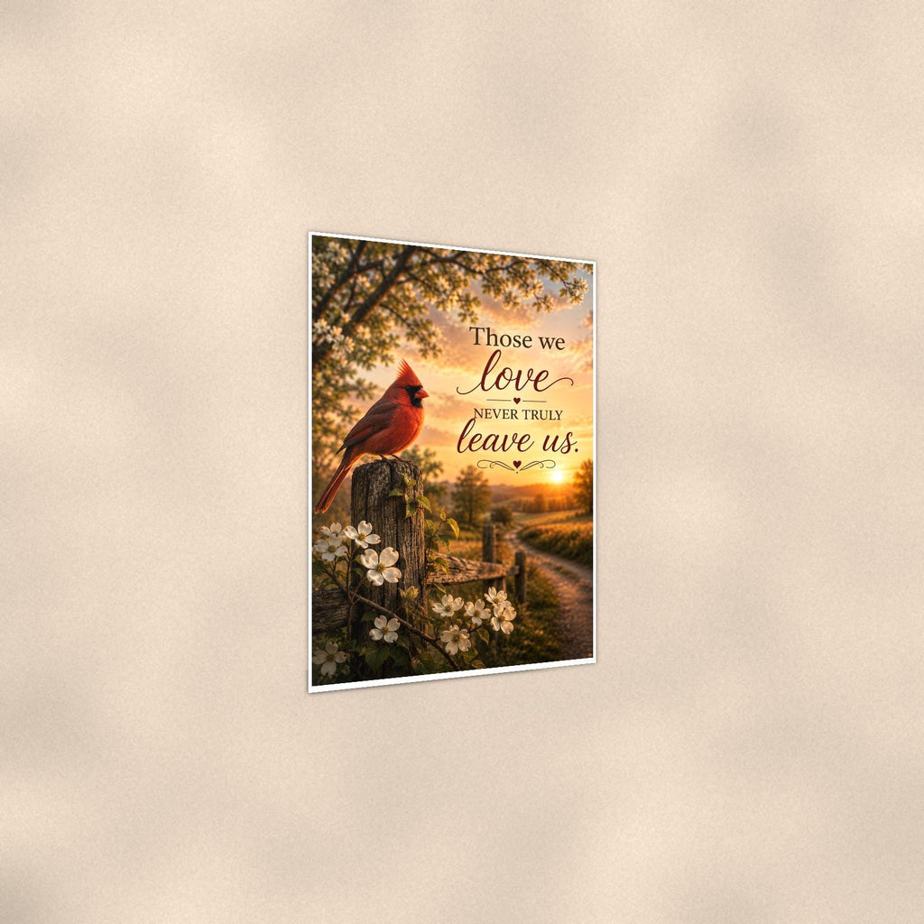Red cardinal on a blossoming fence post memorial art titled "Those we love never truly leave us" on a 24x36 inch luster poster print with a clean white border, shown at a three-quarter angle on the wall