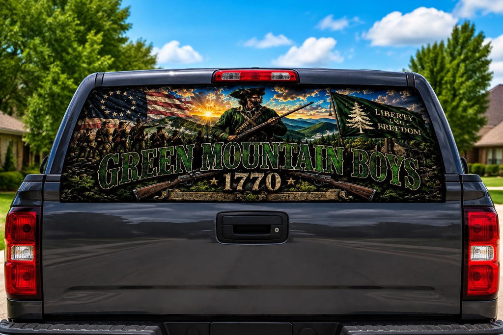 Green Mountain Boys 1770 perforated rear-window decal installed on a pickup truck back glass, showing a colonial militiaman, marching minutemen and the pine flag under a mountain sunrise