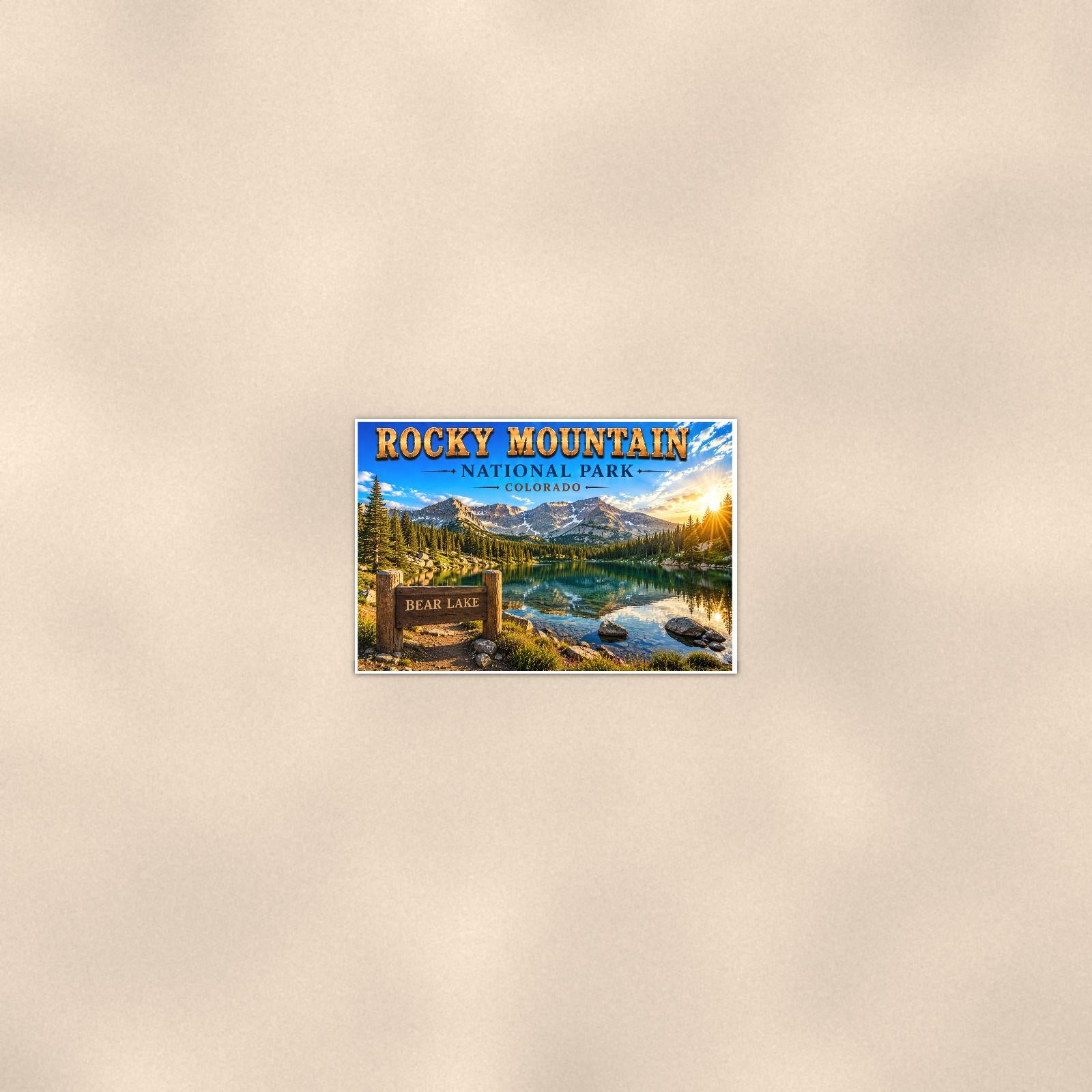 Rocky Mountain National Park - Bear Lake — 36x24 in art print poster, premium luster paper with a white border; poster seen from further back, at true 36x24 in scale on a warm wall.