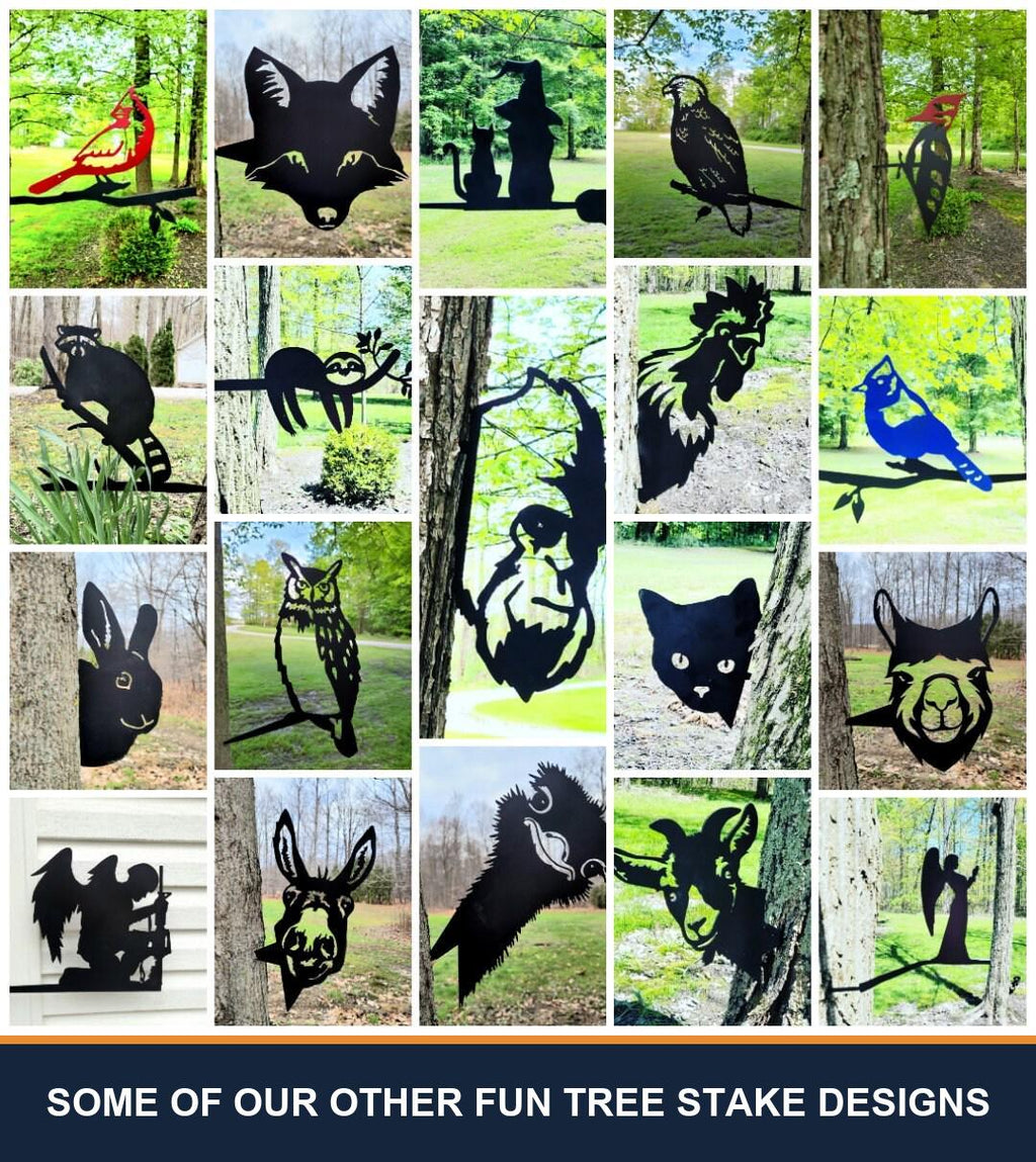 A sampler grid of other TKG metal tree and garden stake designs, shown staked in flower beds and mounted on trees, posts and mailboxes. Captioned “some of our other fun tree stake designs” — these are other designs we make, not what is included with this listing.