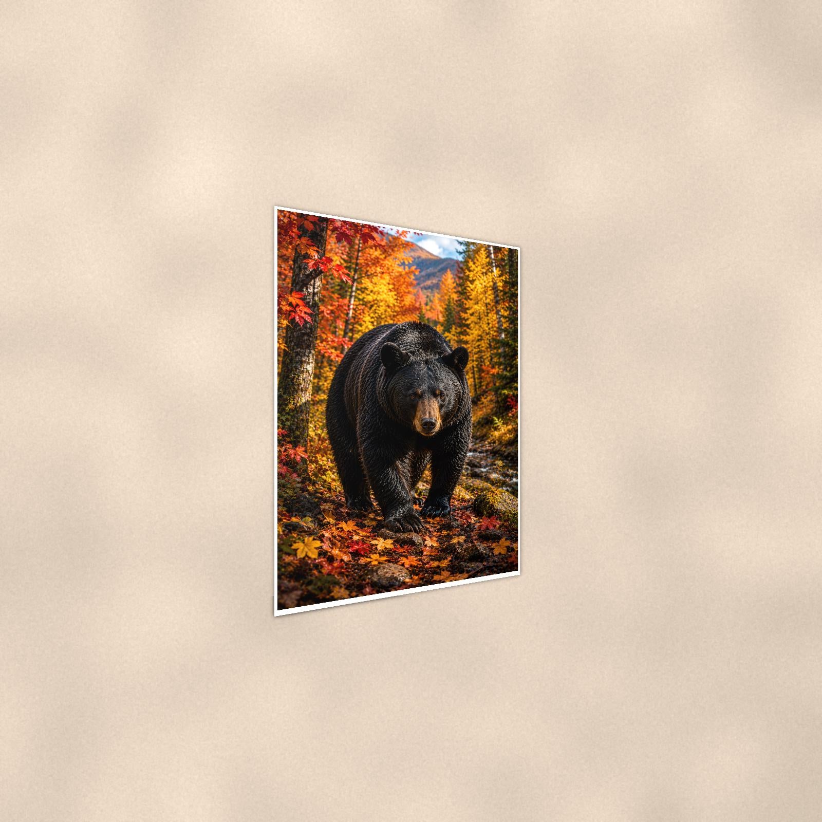 Autumn Forest Bear — 24x36 in art print poster, premium luster paper with a white border; steeper three-quarter angle on a warm wall, catching the luster sheen.