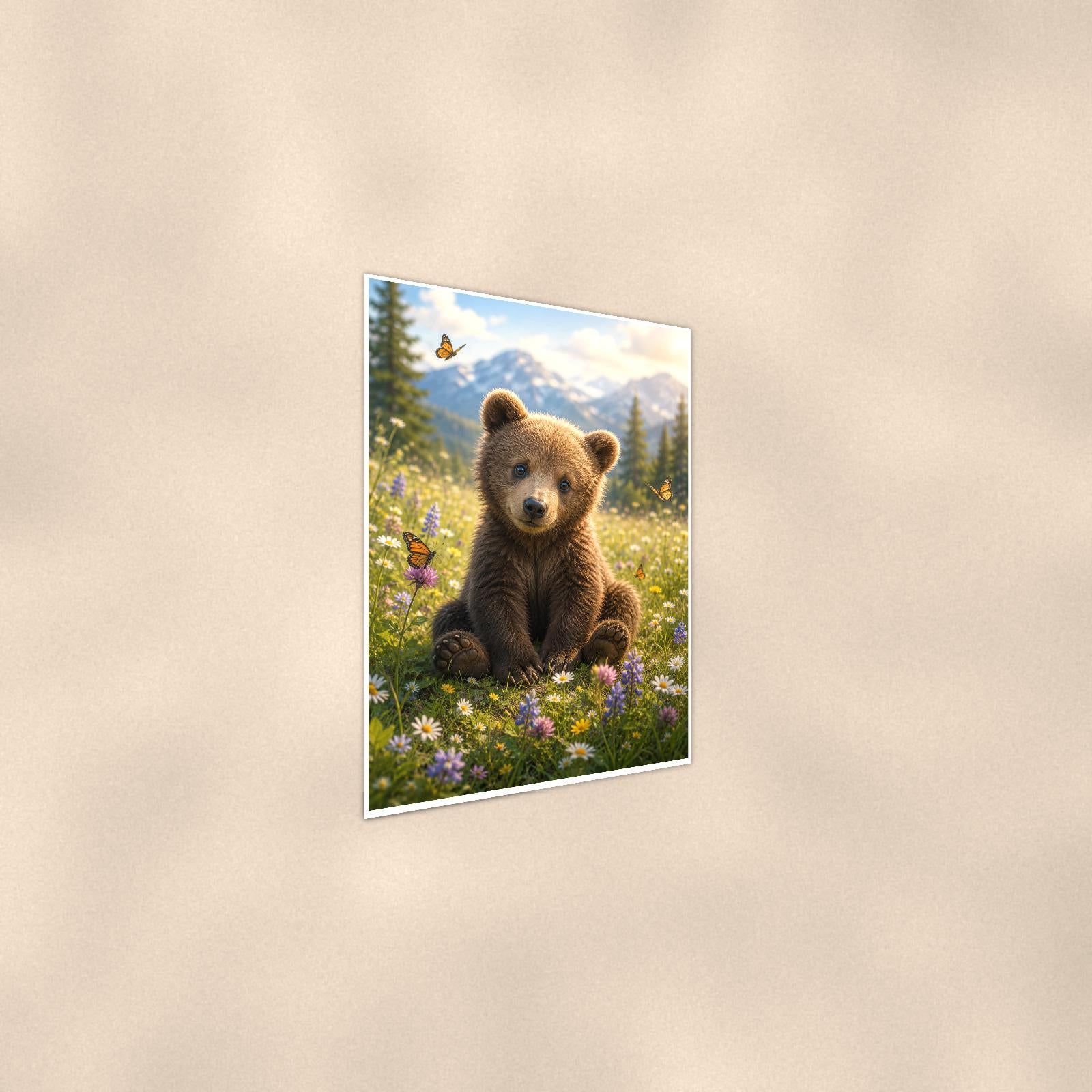 Cub and Butterflies Bear — 24x36 in art print poster, premium luster paper with a white border; steeper three-quarter angle on a warm wall, catching the luster sheen.