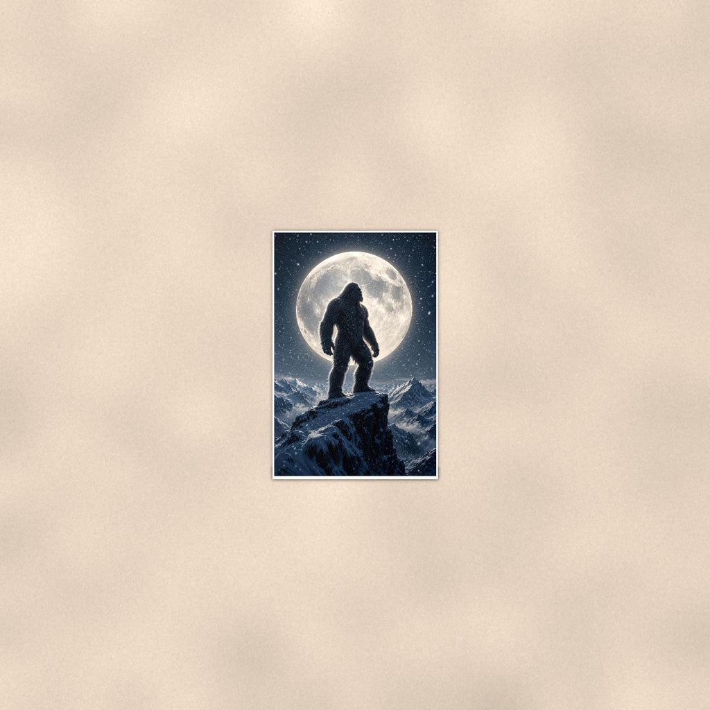 Full Moon Bigfoot — 24x36 in art print poster, premium luster paper with a white border; poster seen from further back, at true 24x36 in scale on a warm wall.
