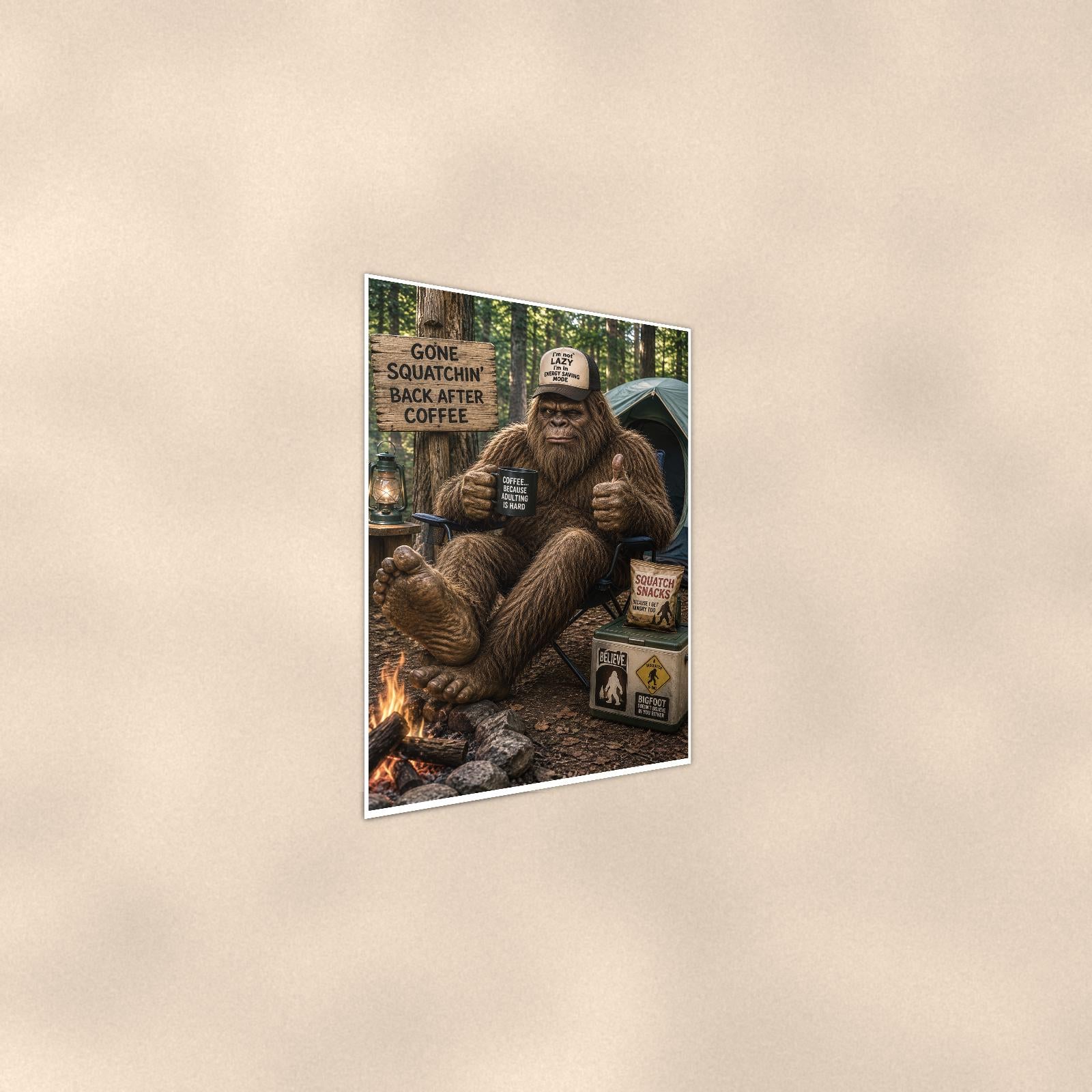 Gone Squatchin Coffee Bigfoot — 24x36 in art print poster, premium luster paper with a white border; steeper three-quarter angle on a warm wall, catching the luster sheen.