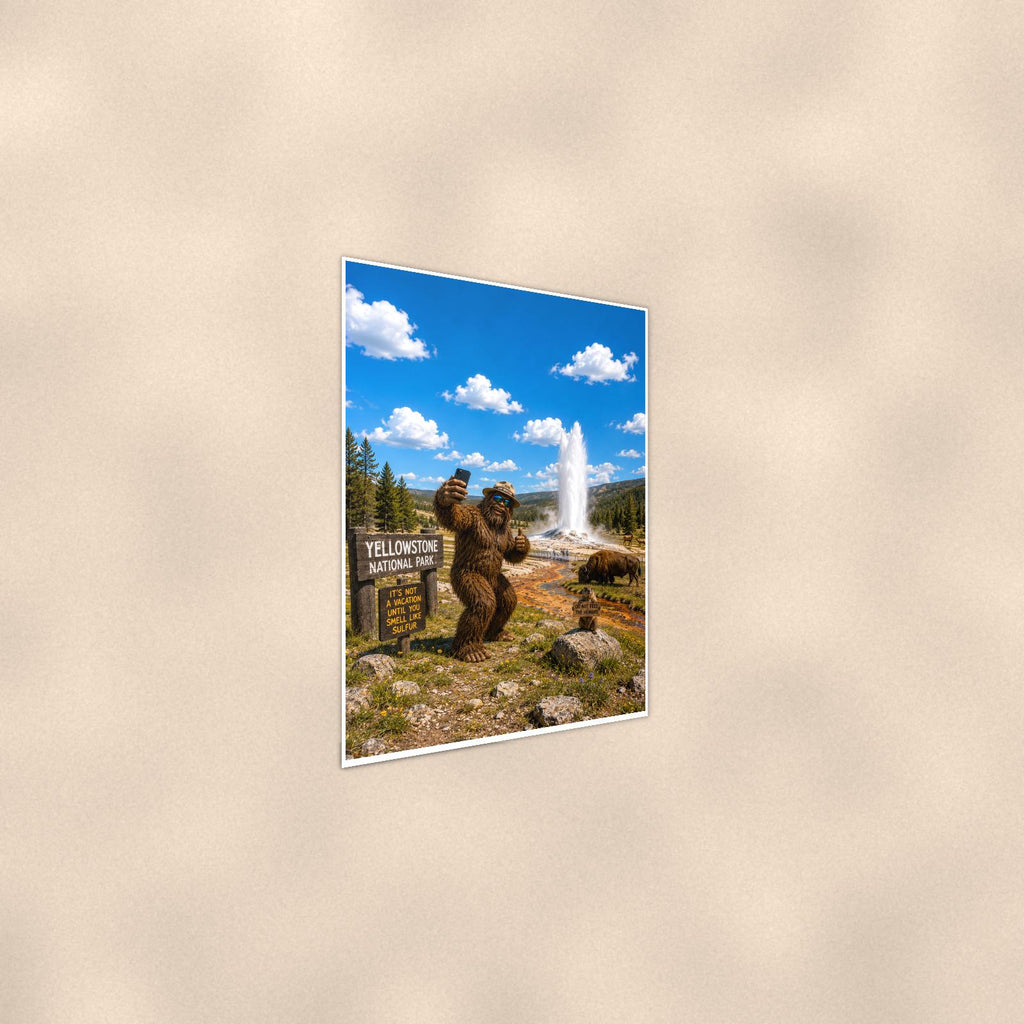 Yellowstone Bigfoot — 24x36 in art print poster, premium luster paper with a white border; steeper three-quarter angle on a warm wall, catching the luster sheen.