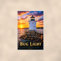 Coastal lighthouse at sunset — 24x36 in art print poster, premium luster paper with a white border; poster shown straight on against a warm wall.