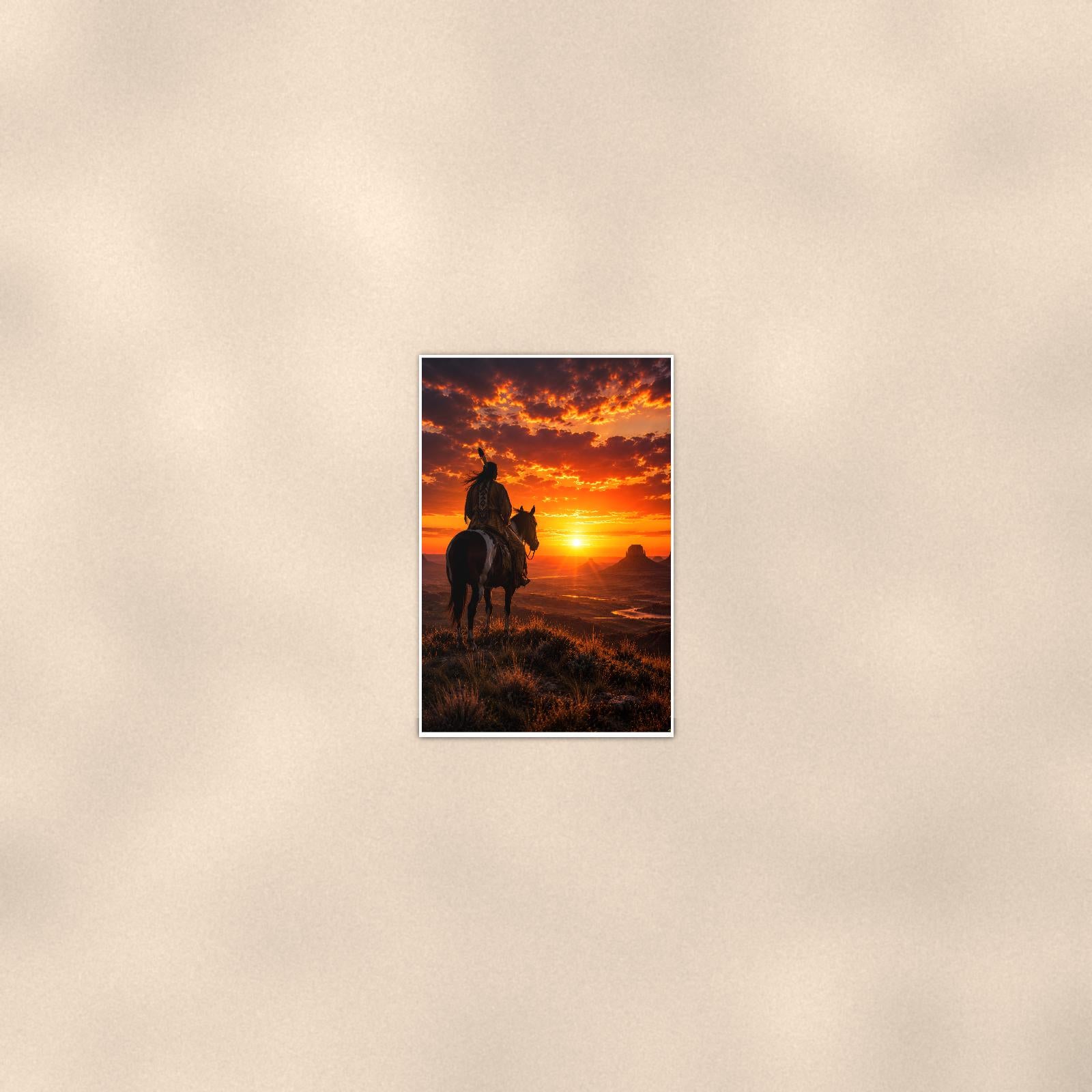Sunset Cowboy Rider — 24x36 in art print poster, premium luster paper with a white border; poster seen from further back, at true 24x36 in scale on a warm wall.
