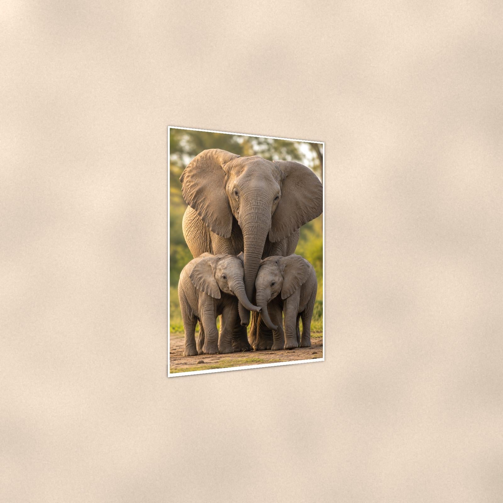 Elephant Family — 24x36 in art print poster, premium luster paper with a white border; gentle three-quarter angle on a warm wall, showing the flat paper edge.
