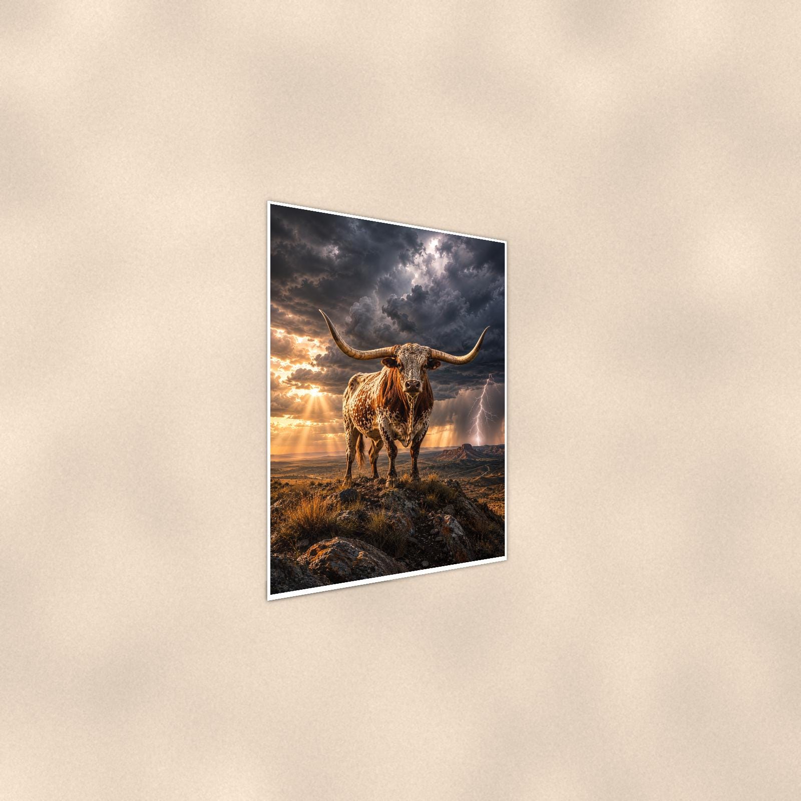 Storm Longhorn — 24x36 in art print poster, premium luster paper with a white border; steeper three-quarter angle on a warm wall, catching the luster sheen.