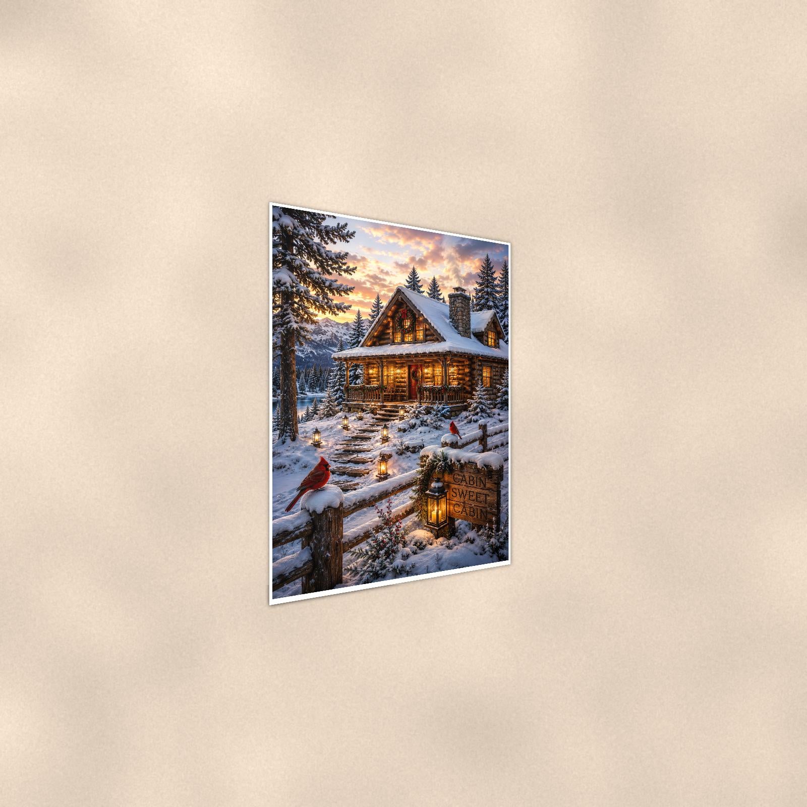 Snowy Cabin Evening — 24x36 in art print poster, premium luster paper with a white border; steeper three-quarter angle on a warm wall, catching the luster sheen.
