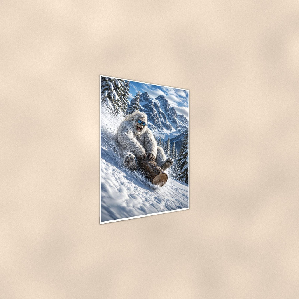 Log Sled Yeti — 24x36 in art print poster, premium luster paper with a white border; steeper three-quarter angle on a warm wall, catching the luster sheen.