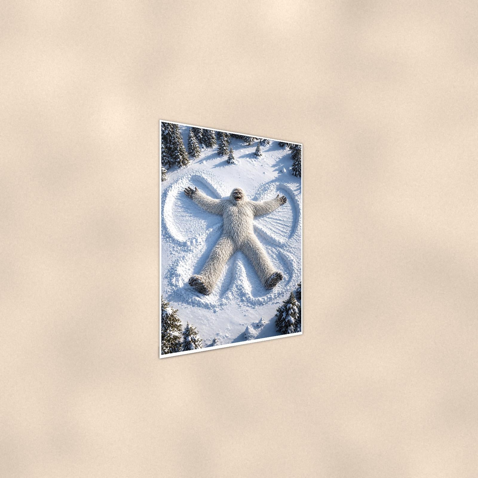 Snow Angel Yeti — 24x36 in art print poster, premium luster paper with a white border; steeper three-quarter angle on a warm wall, catching the luster sheen.