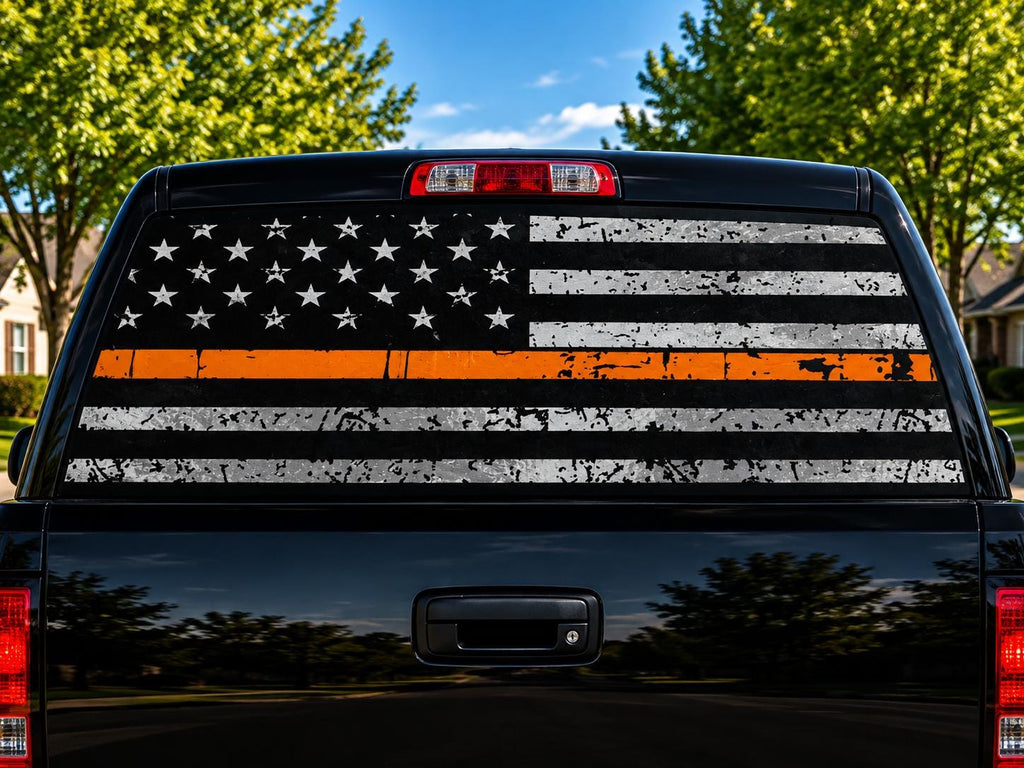 Thin Orange Line Hunter Flag perforated rear-window decal installed on a pickup truck back glass