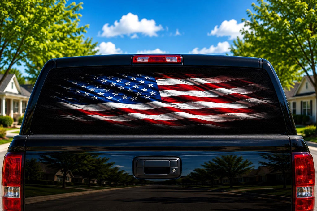 American Flag Wave on Black perforated rear-window decal installed on a pickup truck back glass
