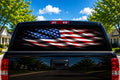 American Flag Wave on Black perforated rear-window decal installed on a pickup truck back glass