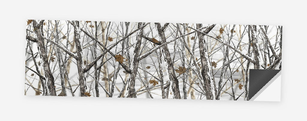 Winter Birch and Birds 68 x 18.5 inch perforated vinyl truck decal printed flat on white, corner folded up showing the perforation pattern and liner