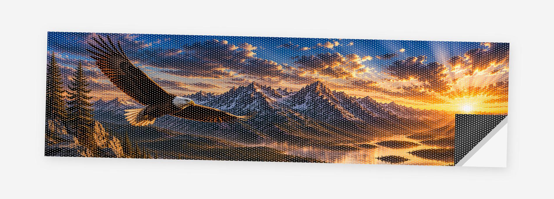 Soaring Eagle Sunrise 68 x 18.5 inch perforated vinyl truck decal printed flat on white, corner folded up showing the perforation pattern and liner