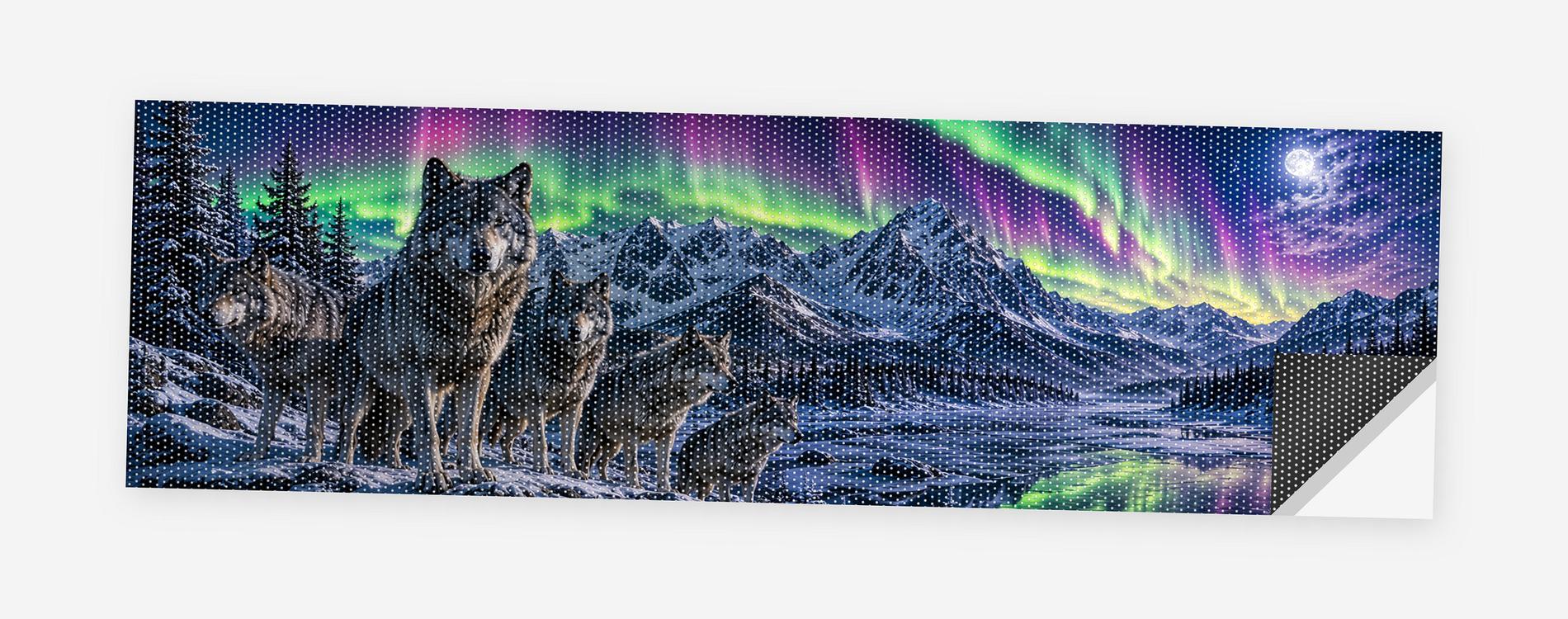 Wolves Under the Aurora 68 x 18.5 inch perforated vinyl truck decal printed flat on white, corner folded up showing the perforation pattern and liner