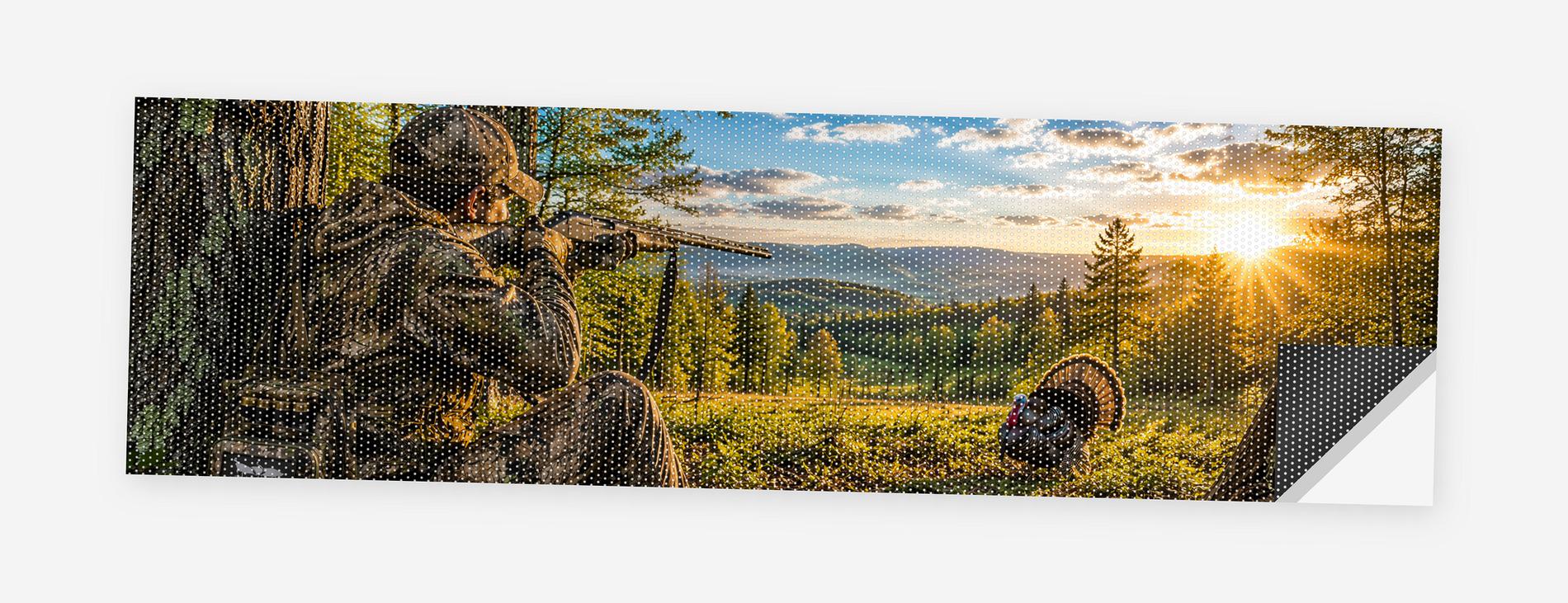 Fall Turkey Hunt 68 x 18.5 inch perforated vinyl truck decal printed flat on white, corner folded up showing the perforation pattern and liner