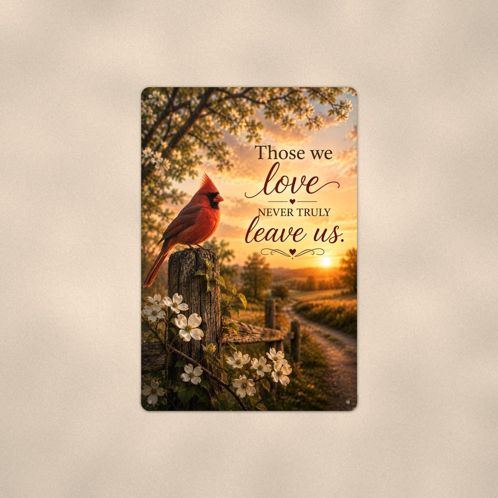 Red cardinal on a blossoming fence post memorial art titled "Those we love never truly leave us" on a 8x12 inch sublimated aluminum sign with rounded corners and mounting holes, shown straight on against a second warm wall tone