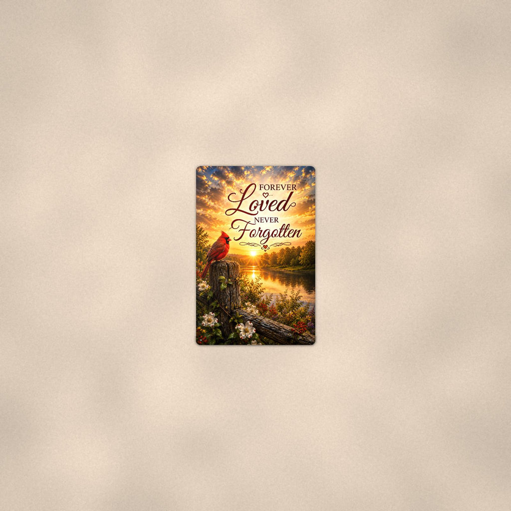 Cardinal at sunrise over the river memorial art titled "Forever Loved Never Forgotten" on a 8x12 inch sublimated aluminum sign with rounded corners and mounting holes, seen from farther back, small on a softly lit wall
