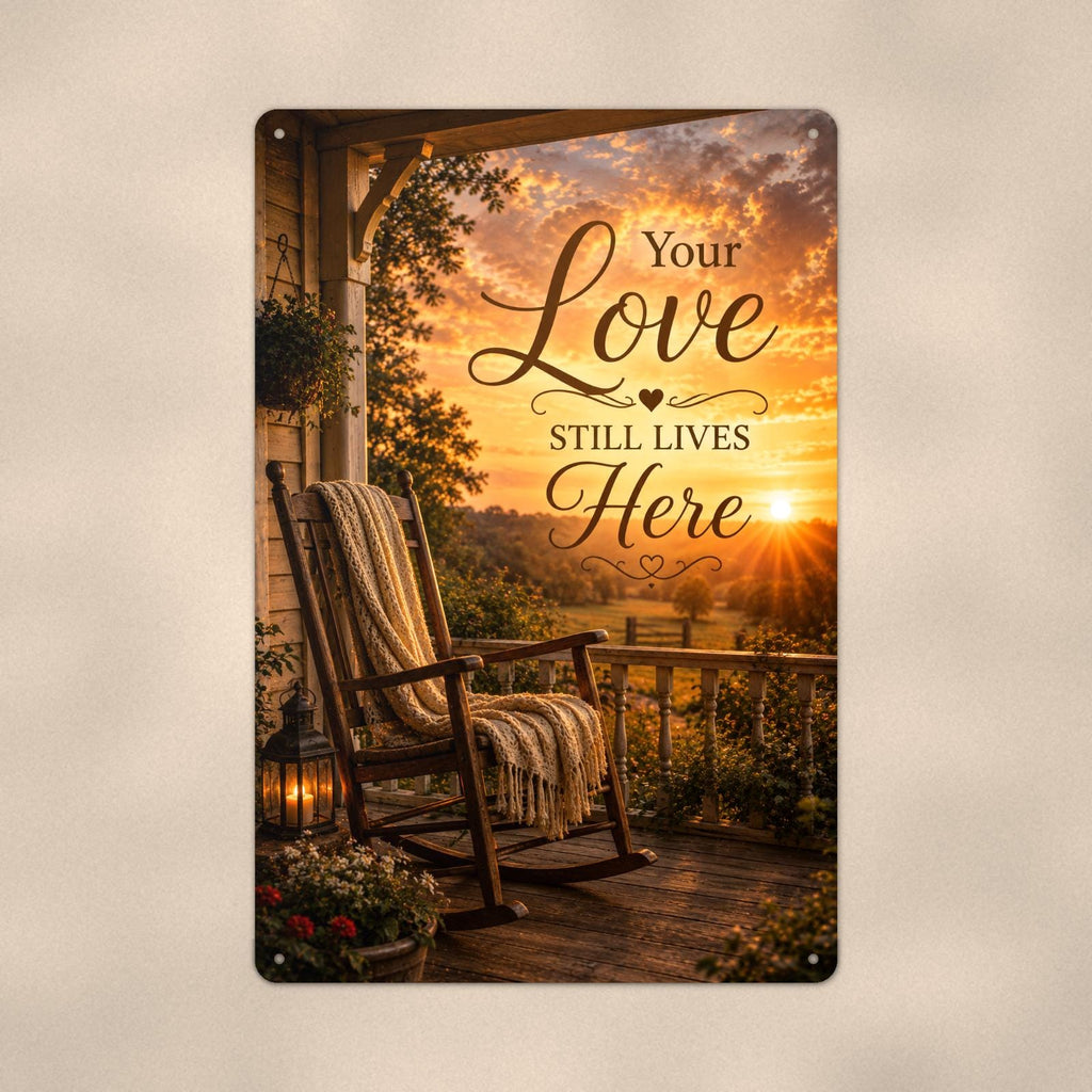 Rocking chair on the porch at sunset memorial art titled "Your Love Still Lives Here" on a 8x12 inch sublimated aluminum sign with rounded corners and mounting holes, close-up view filling the frame, showing the smooth sublimated print surface