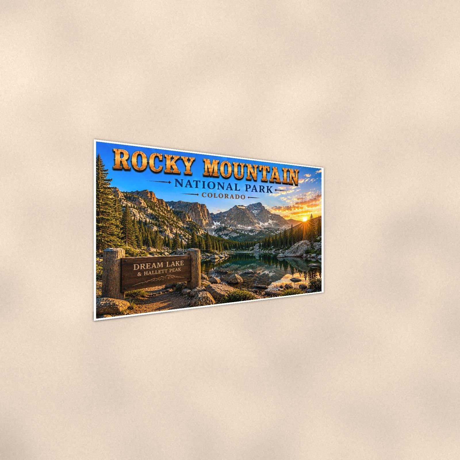 Rocky Mountain National Park - Dream Lake — 36x24 in art print poster, premium luster paper with a white border; steeper three-quarter angle on a warm wall, catching the luster sheen.