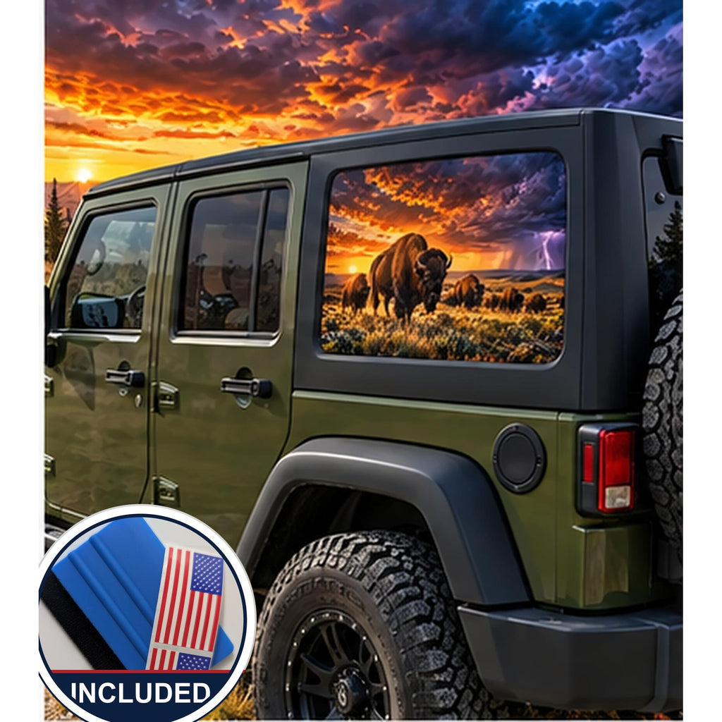 Jeep Wrangler 4-door rear quarter window with a perforated decal of a bison herd grazing on the prairie at sunset, a lightning storm with purple clouds rolling in on the right side of the scene, applied to the outside of the glass. An INCLUDED badge in the corner shows the felt squeegee and 2 American flag decals that come with every set.