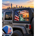 Jeep Wrangler 4-door rear quarter window with a perforated decal of the Statue of Liberty holding her torch in front of a waving American flag and the New York City skyline at sunset, applied to the outside of the glass. An INCLUDED badge in the corner shows the felt squeegee and 2 American flag decals that come with every set.