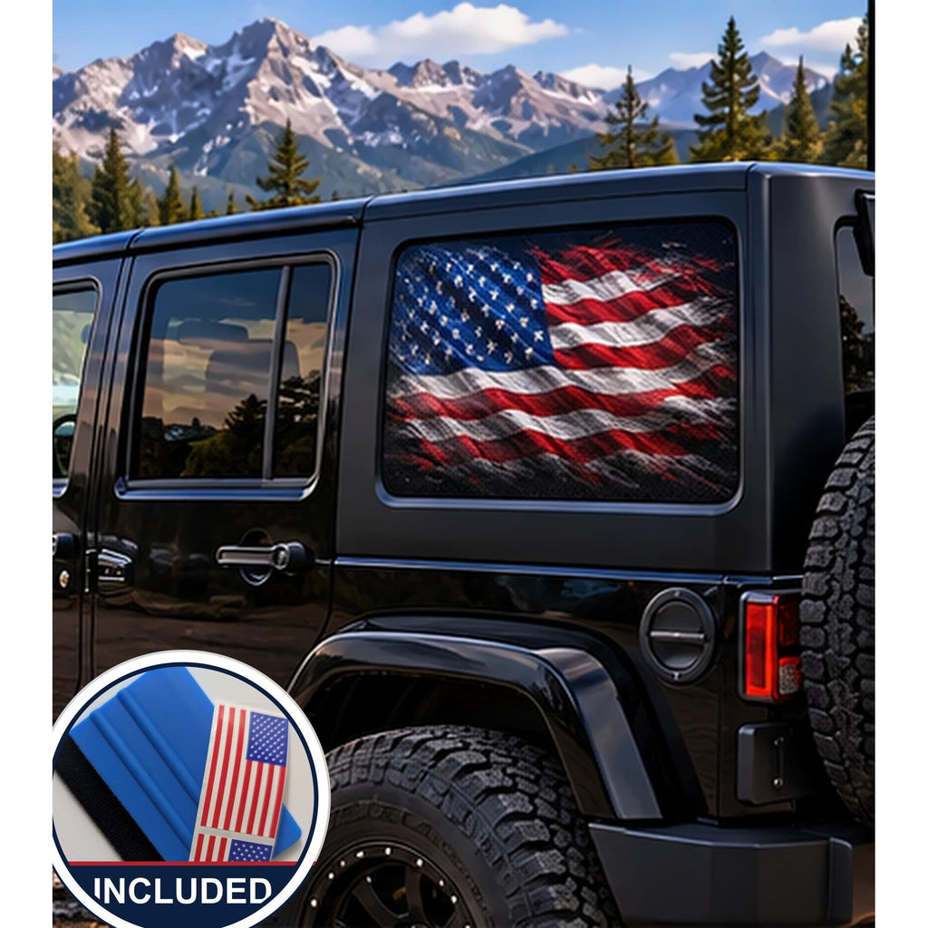Jeep Wrangler 4-door rear quarter window with a perforated decal of a full-color, weathered American flag waving against a plain black background, applied to the outside of the glass. An INCLUDED badge in the corner shows the felt squeegee and 2 American flag decals that come with every set.