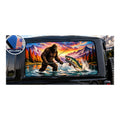 Jeep Wrangler 2-door rear side window with a perforated decal of Bigfoot fly-fishing in a mountain river at sunset, a trout jumping from the water, applied to the outside of the glass. An INCLUDED badge in the corner shows the felt squeegee and 2 American flag decals that come with every set.