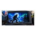 Jeep Wrangler 2-door rear side window with a perforated decal of Bigfoot walking beside a mountain lake under a full moon and green and purple northern lights, applied to the outside of the glass. An INCLUDED badge in the corner shows the felt squeegee and 2 American flag decals that come with every set.